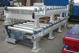 Galvanised roller conveyor for transport of fibre-cement plates Galvanised roller conveyor for transport of fibre-cement plates (two conveyors are stacked atop each other)